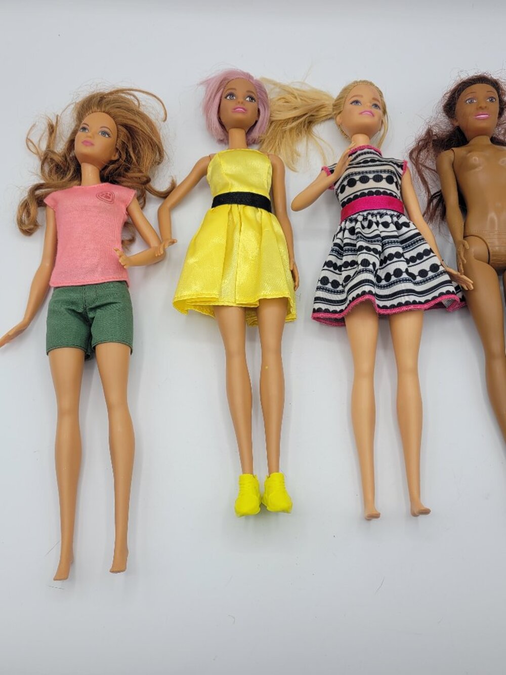 Lot of 4 Modern Mattel Barbie Dolls 3 W/ Clothes 1 W/ Out Clothes